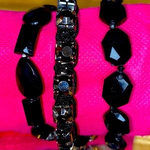 Vintage two stretch bracelets in black diamond cut beaded. One adjustable strap